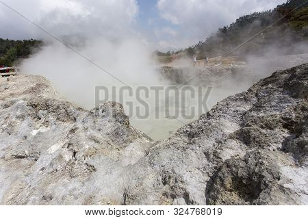 Dieng Plateau, Indonesia - August 06, 2017: Clouds Emerging From Sikidang, Dieng Plateau, Indonesia