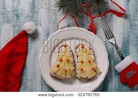 New-year Sandwiches With Cheese, Pineapples And Crab Stiks In The Form Of A Christmas Tree And Decor