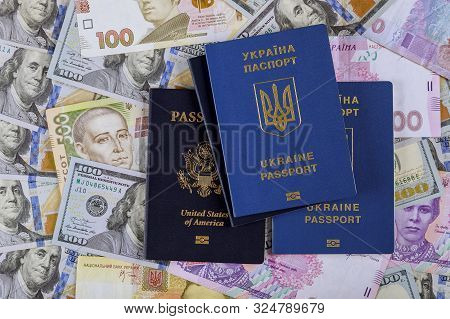 Ukrainian Passport With Dual Citizens Us Passport Hryvnia Banknotes And Us Dollar Bills