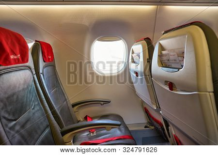 VENICE, ITALY - CIRCA MAY, 2019: interior shot of Austrian Airlines Embraer ERJ-195LR