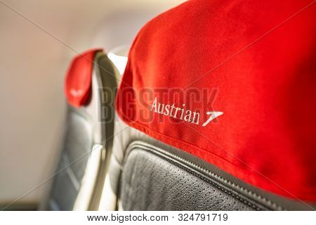 VENICE, ITALY - CIRCA MAY, 2019: close up shot of Austrian Airlines sign in Embraer ERJ-195LR.
