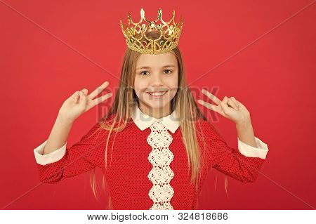 Childhood Happiness. Happy Little Girl On Red Background. Small Girl Child. School Education. Family