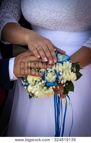 Hands, Rings And Bouquet.wedding Photo Of A Lifetime