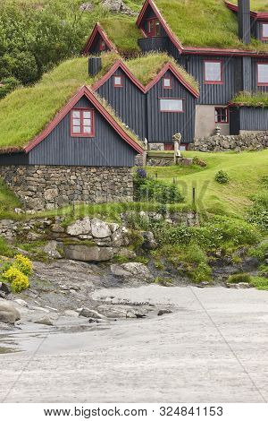 Traditional Green Roof  Wooden Faroese Houses In Black And Red