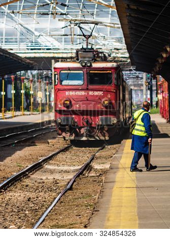 Train Crew Waiting To Do The Last Checking On The Train Platform At The Railway Station Of Bucharest