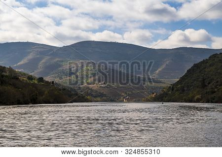 Scenic View Of The Douro River And Valley With Terraced Vineyards Near The Pinhao Village, In Portug