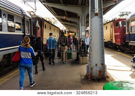 People Getting Off The Train At Bucharest North Railway Station (gara De Nord) In Bucharest, Romania