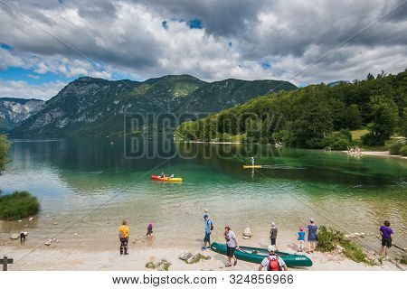 Bohinj, Slovenia - July 2ì14, 2019: Tourists In The Bohinj Lake In The Summer Season, Slovenia