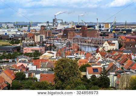 Wismar, Germany - September 28, 2019: Wismar Old Town And Harbor With Industry From Above, Aerial Ci