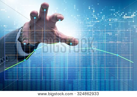 Businessman controlling the market with strings