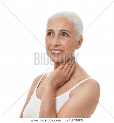 Portrait Of Beautiful Mature Woman On White Background