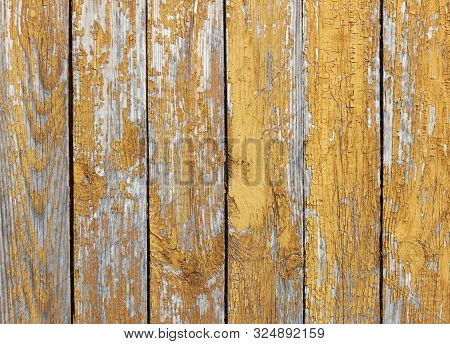 Texture Of Old Boards Painted In Brown. Peeling Paint On The Boards. Close Up.