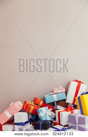 Multicolored Birthday Presents On A Grey Background