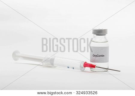 Medical Concept Showing Medical A Medical Vial Reading Oxycontin And A Syringe