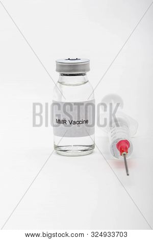 Medical Concept Showing Medical A Medical Vial Reading Mmr Vaccine With A Syringe