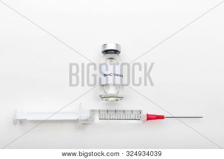 Medical Concept Showing Medical A Medical Vial Reading Menc Vaccine With A Syringe