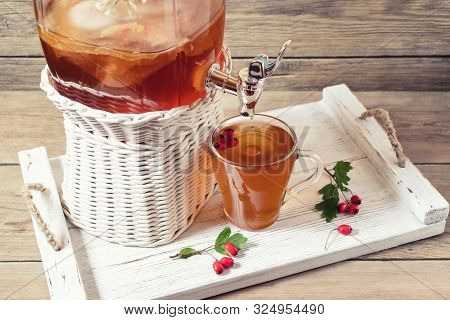 Fresh Homemade Kombucha Fermented Tea Drink In A Jar With Faucet And In A Cup On A White Tray With H