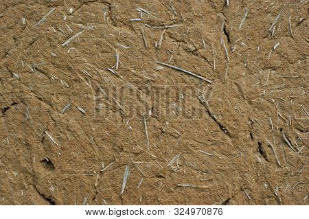 Old Wall Of A Combination Of Red Clay And Straw