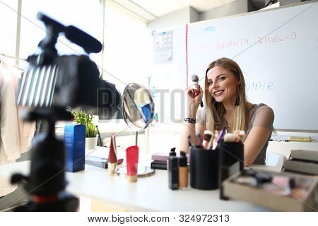 Caucasian Woman Blogger Creating Beauty Video Blog. Female Makeup Artist Recording Cosmetics Apply T