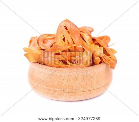 Mace In A Wooden Bowl, Isolated On White Background. Nutmeg Flower, Myristica Fragrans. Natural Spic