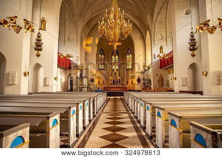 Lulea, Sweden - July 05, 2019: Cathedral Catholic, Parishioners Pray