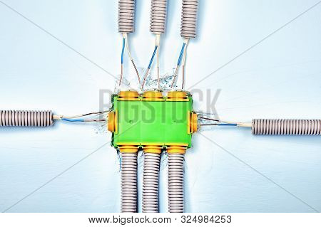Electrical Junction Box In The Process Of Installation. Electrical Conduits Terminate At The Sides A