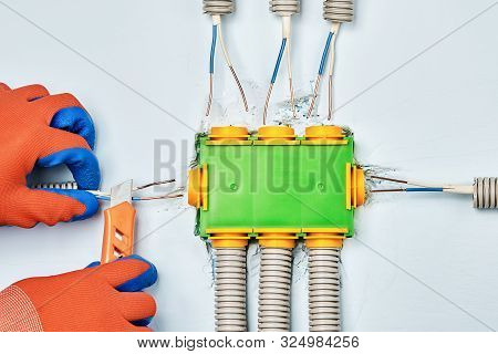 Residential Electrical Services, Installation Of Plastic Junction Box Or Electrical Box. Connecting 