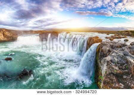 Incredible Landscape Scene Of Powerful Godafoss Waterfall. Dramatic Sky Over Godafoss. Location: Bar