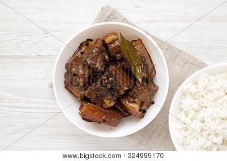 Homemade Filipino Adobo Pork With Rice On A White Wooden Background, Top View. Flat Lay, Overhead, F