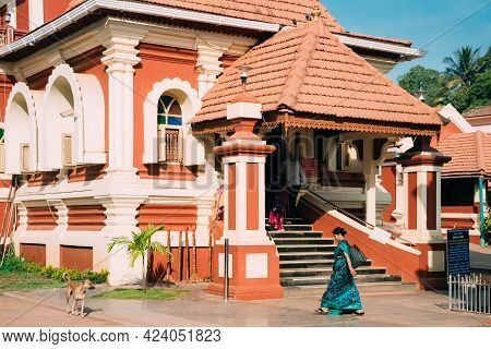 Kavlem, Phonda, Goa, India - February 20, 2020: Indian Woman Walking Near Shree Shantadurga Mandir, 