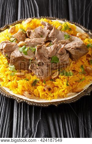 Mansaf Is A Traditional Arab Dish Made Of Lamb Cooked In A Sauce Of Fermented Dried Yogurt And Serve