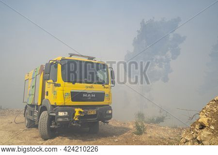 Mevasseret Zion, Israel - June 19th, 2021: A Fire Engine Near The Site Of A Pine Forest Fire On The 