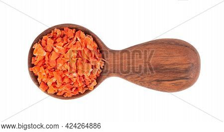 Dry Carrot In Wooden Spoon, Isolated On The White Background. Chopped Dried Carrot. And Herbs. Top V
