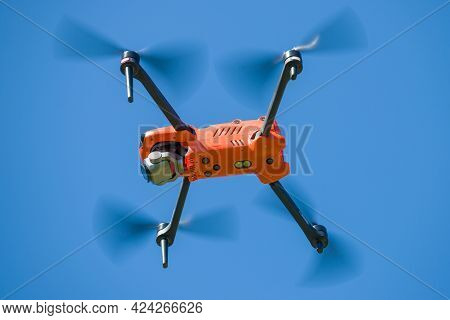 Leningrad Region, Russia - May 30, 2021: Quadcopter Autel Robotics Evo Ii In Flight. Bottom View