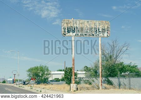 Wilcox, Arizona - May 8, 2021: Old, Rusty Abandoned Sign For A Former Truck City Truck Stop And Gas 