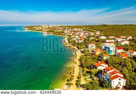Aerial Top View Of Village Petrcane, Croatia. Touristic Background With Blue Sea, Coastline And Red 