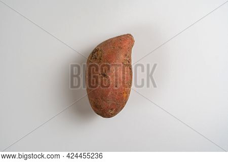 Raw Sweet Potato Or Batat Flat Lay Isolated, Minimal Simple Concept Of Healthy Nutrition Diet
