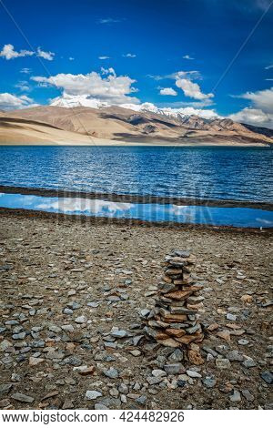 Stone cairn at Himalayan lake Tso Moriri, Korzok, Changthang area, Ladakh, Jammu and Kashmir, India