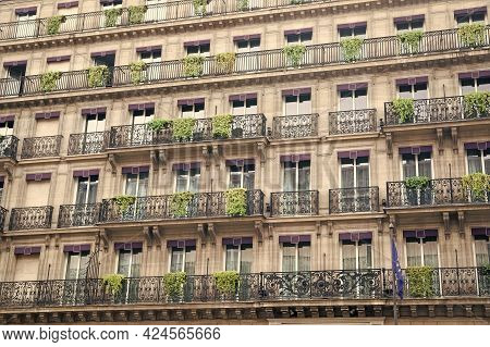 Facade Building With Windows And Balconies. Architecture And Design Concept. European Architecture. 