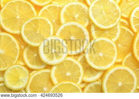 Many Fresh Juicy Lemon Slices As Background, Top View