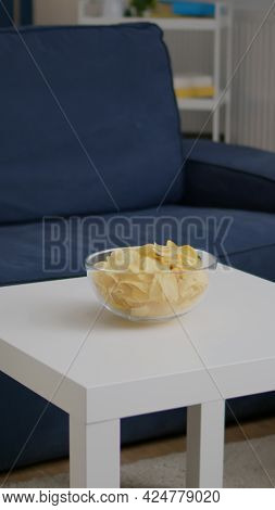 Modern Empty Apartament With Nobody In It Is Ready For Night Party Having Chips Bowl On Woden Table.