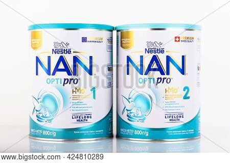 Moscow, Russia - July 8, 2021: Milk Formula In Cans For Feeding Babies, Nan 1 Optipro, Nan 2 Optipro