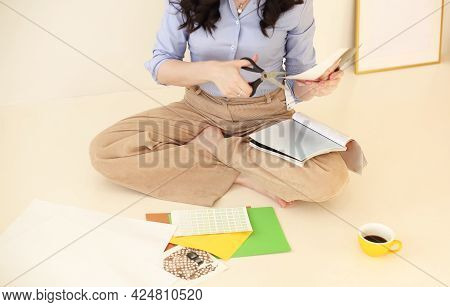 Young Brunette Woman Creating Her Feng Shui Wish Map. Dreams And Wishes