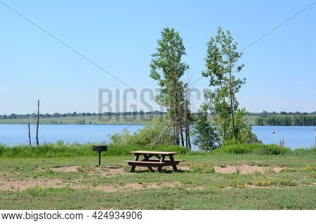Summertime Standley Lake In Westminster Colorado Landscape With Picnic Table And Outdoor Grill With 
