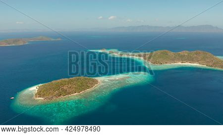 Aerial Seascape Tropical Beach With White Sand And Clear Blue Sea. Tropical Landscape With Islands A