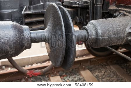 Close Up Of A Train Car Coupler Joint