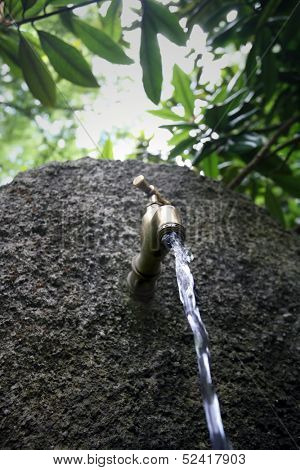 Water running from outdoor tap