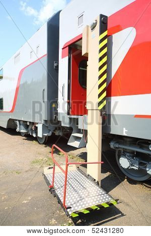 TVER - JUN 05: Lift for wheelchairs near the entrance to the two-storey passenger carriage, on June 05, 2013 in Tver, Russia.