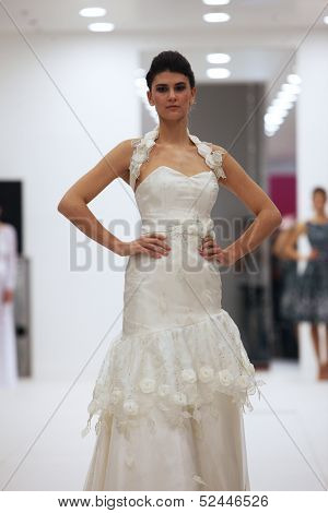 ZAGREB, CROATIA - OCTOBER 12: Fashion model in wedding dress made by Lorien on 'Wedding Expo' show in the Westgate Shopping City in Zagreb, Croatia on October 12, 2013