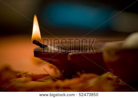 Close up of indian earthen oil lamp